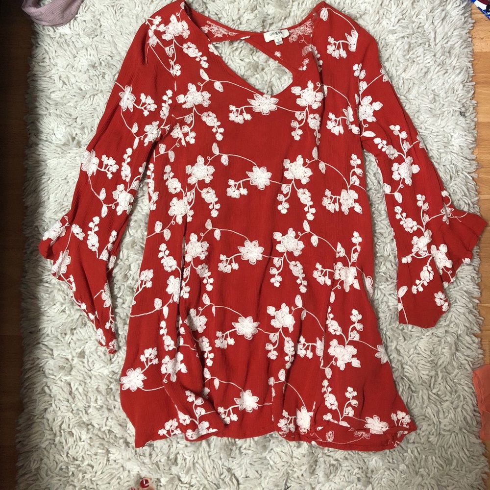 Flowy bell sleeved dress.